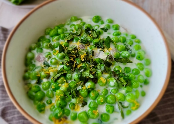 Close up view of bowl of Minty Creamed Peas
