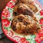 Plate of Juicy, Flavorful Split Chicken Breasts made in the slow cooker.