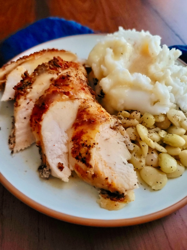 Plate of Slow Cooker Chicken Breasts with Lima Beans and Mashed Potatoes