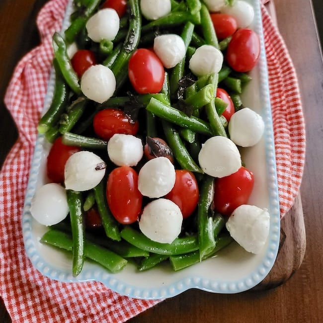 Plate of Green Beans with Tomatoes and Mozzarella