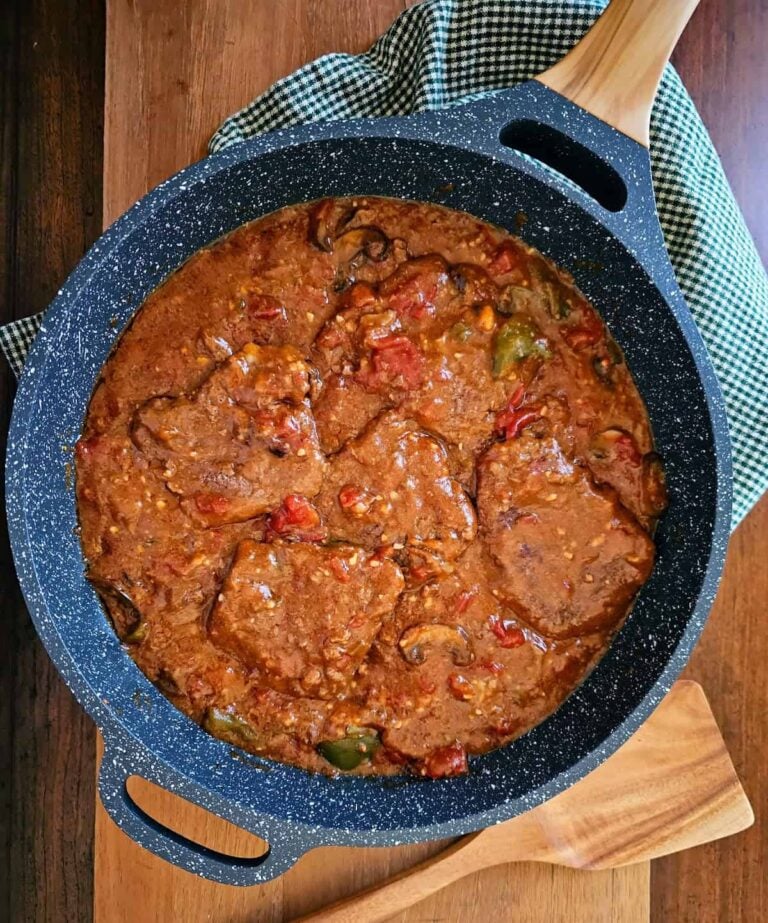 Old-Fashioned Swiss Steak Recipe (Smothered in Tomato Gravy)